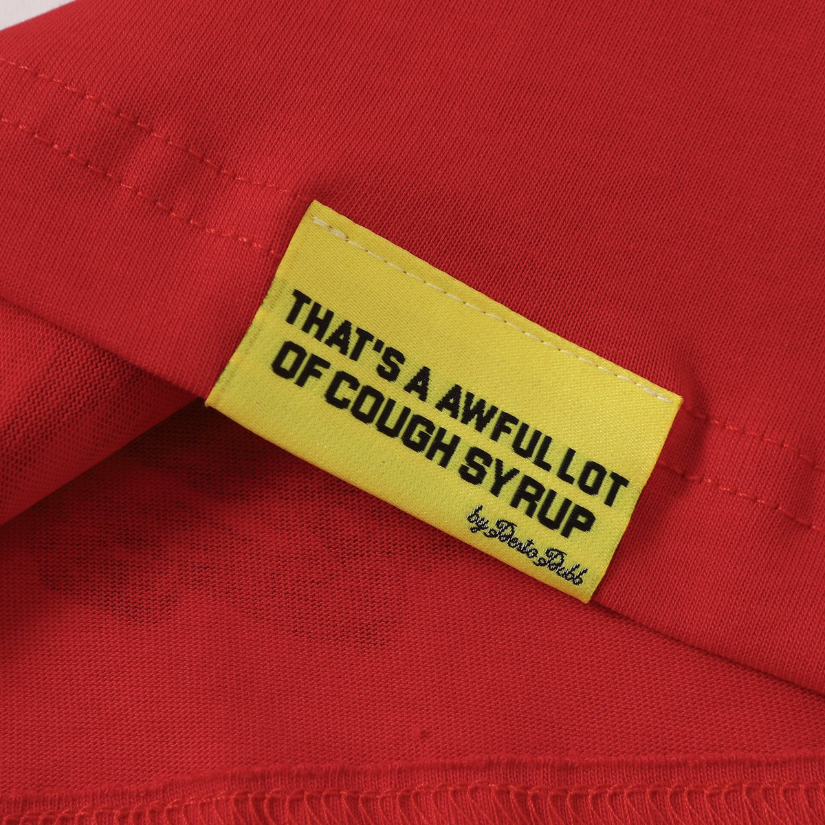 THAT'S A AWFUL LOT OF COUGH SYRUP Bottle Graphic T-Shirt ¡ª hang_tag