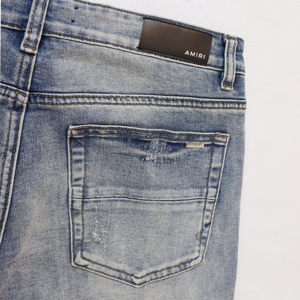 AMIRI Sinners Distressed Skinny Jeans ¡ª detail