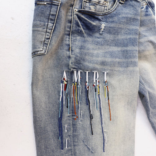 AMIRI Sinners Distressed Skinny Jeans ¡ª front