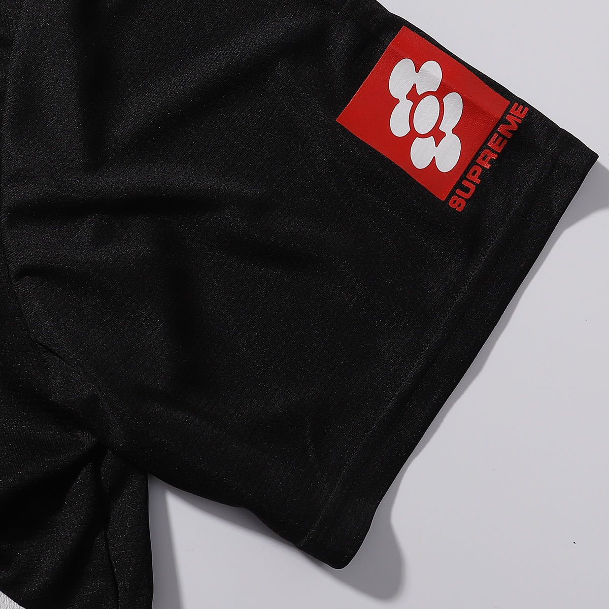 Supreme Black Soccer-Inspired Jersey Graphic T-Shirt ¡ª fabric_closeup