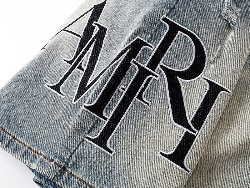 AMIRI Light Blue Distressed Monogram Denim Shorts ¡ª detail