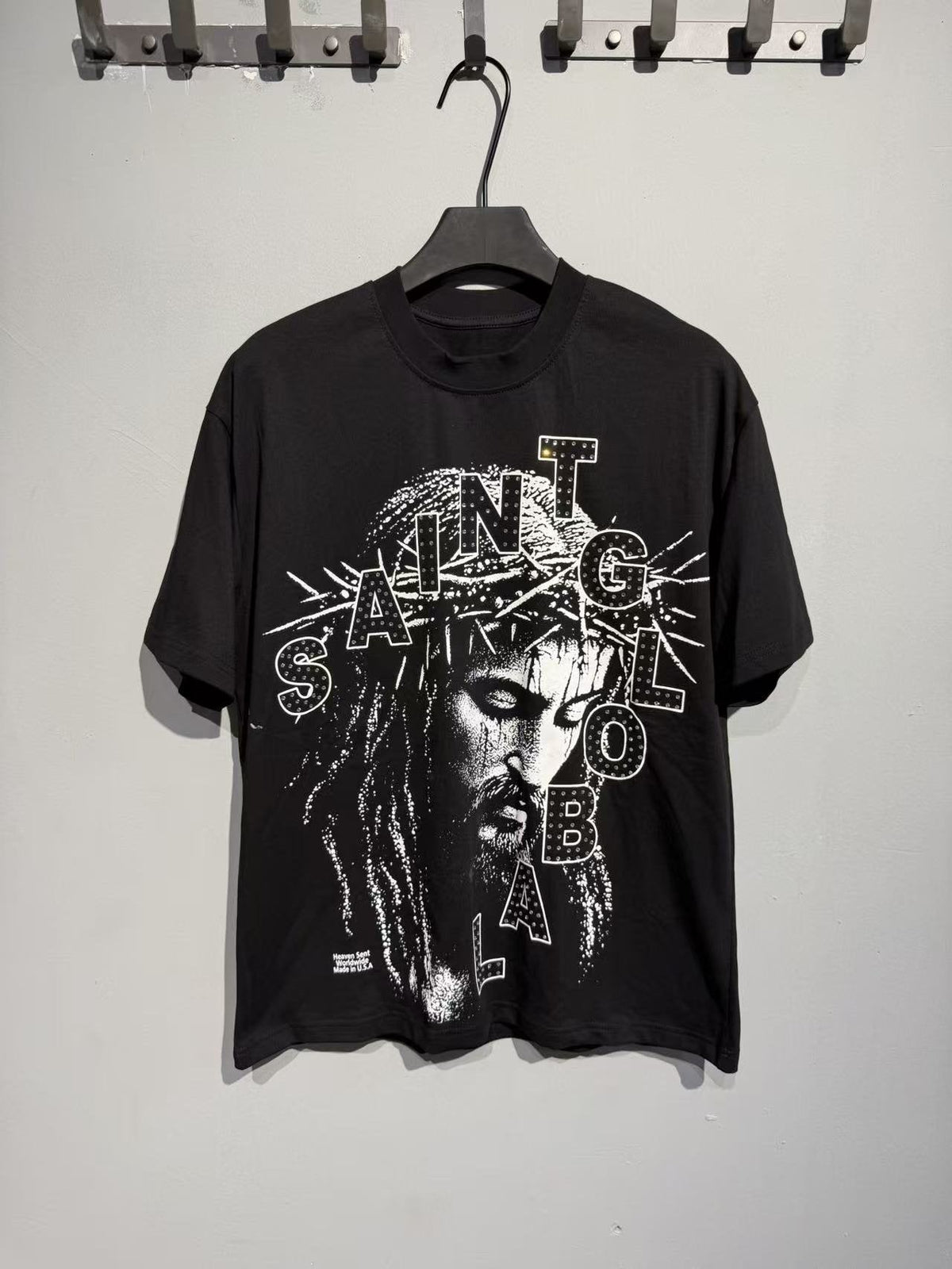 SAINT Monochrome Face Typography Graphic T-Shirt ¡ª hero