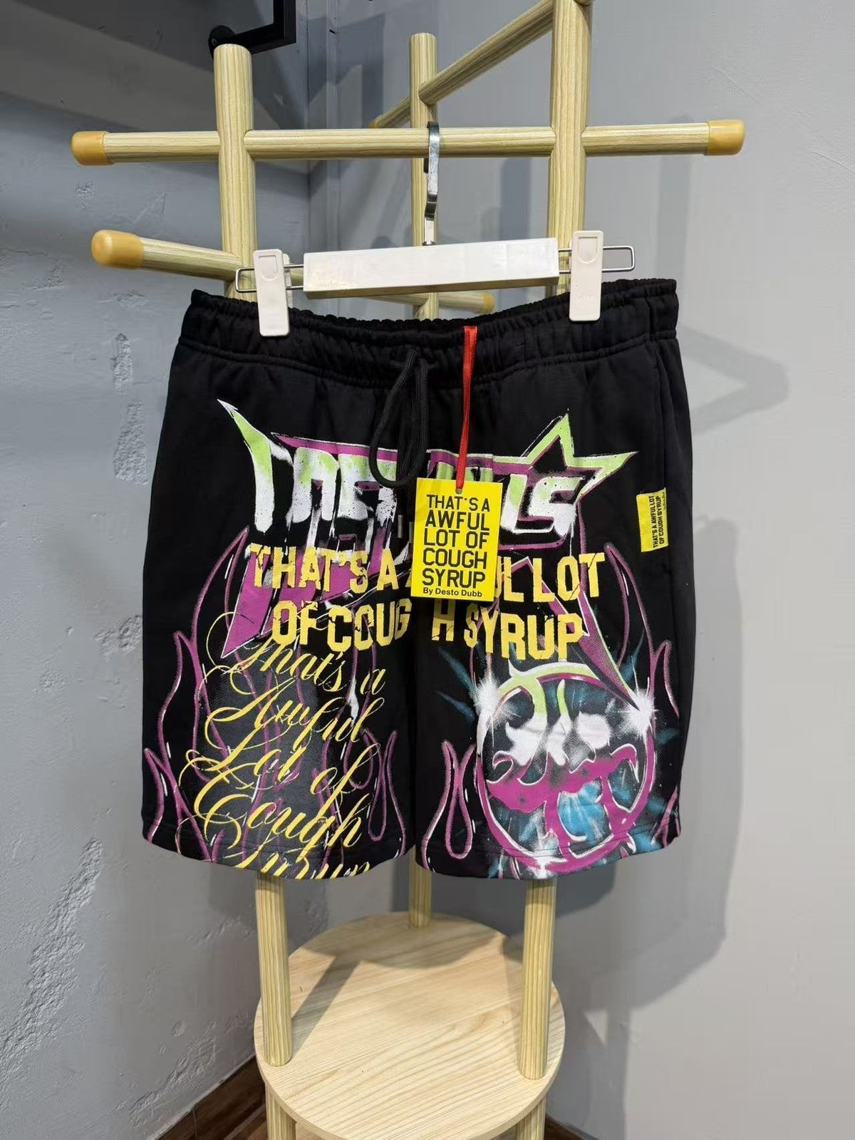 THAT'S A AWFUL LOT OF COUGH SYRUP Black Graphic Drawstring Shorts ¡ª front