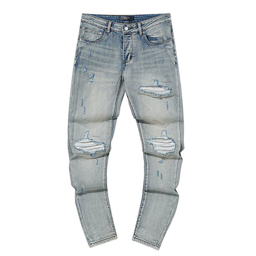 AMIRI Light Blue Distressed Ripped Knee Jeans ¡ª hero
