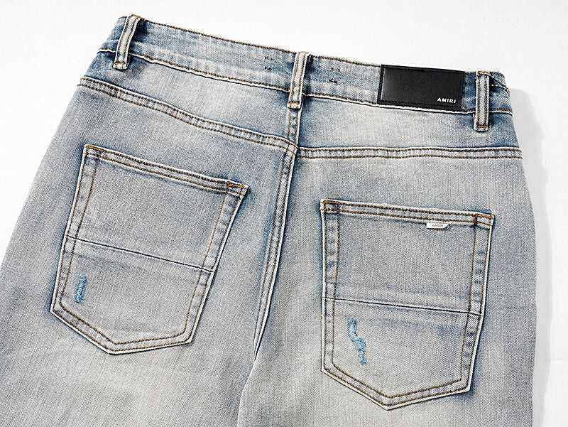 AMIRI Light Blue Distressed Ripped Knee Jeans ¡ª detail