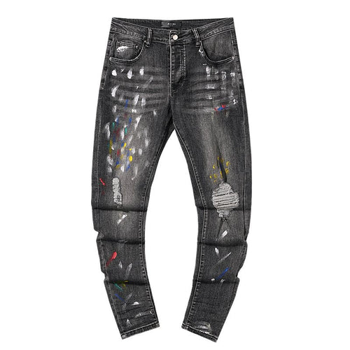 AMIRI Paint-Splatter Distressed Jeans ¡ª hero