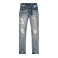 AMIRI Light Blue Distressed Letter Applique Jeans ¡ª front